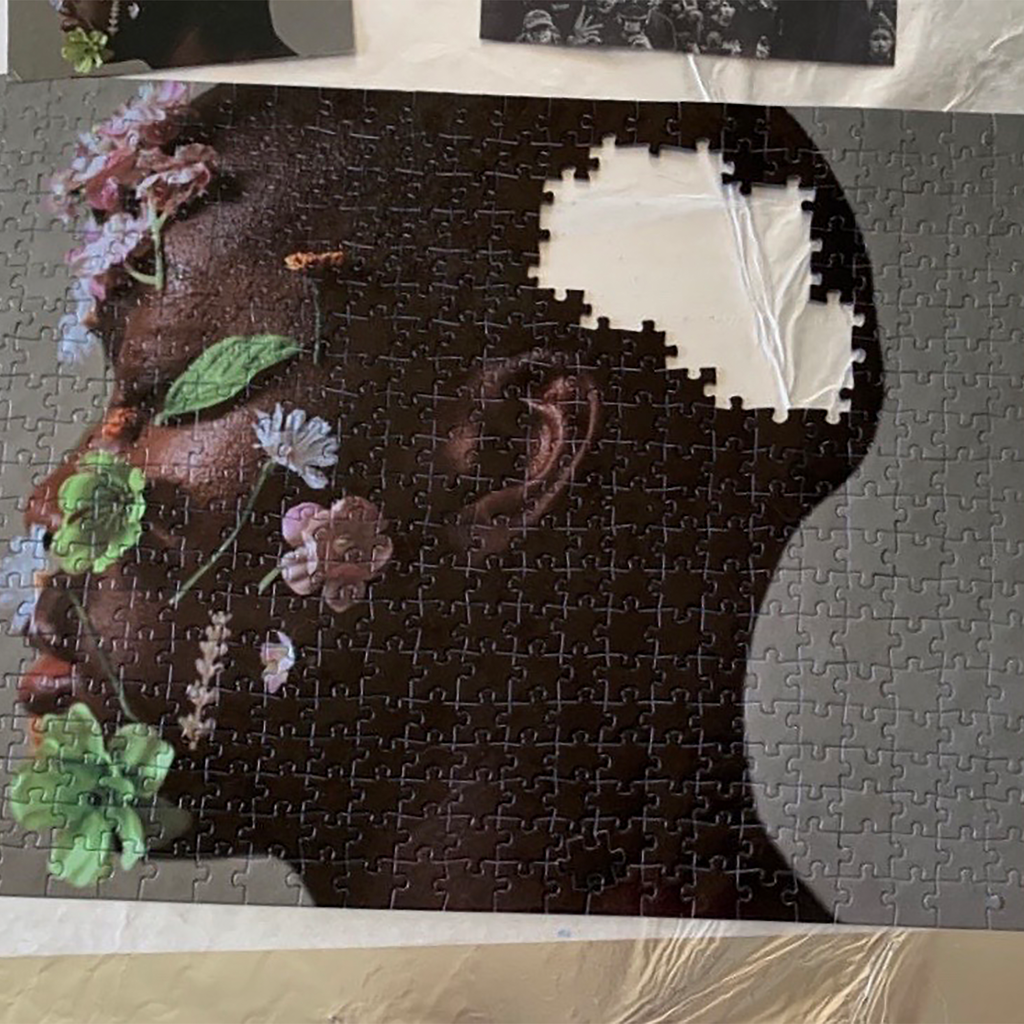 black boy, with flowers, puzzle